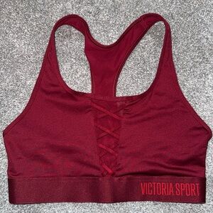 Victoria’s Secret sports bra, ruby red color and size small.